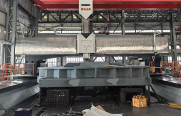 Hoe kunnen grote CNC-portaalfreesmachines de bewerking van zware componenten vergemakkelijken? De aangepaste apparatuur van Tangshan Yuexin Machinery is met succes geassembleerd